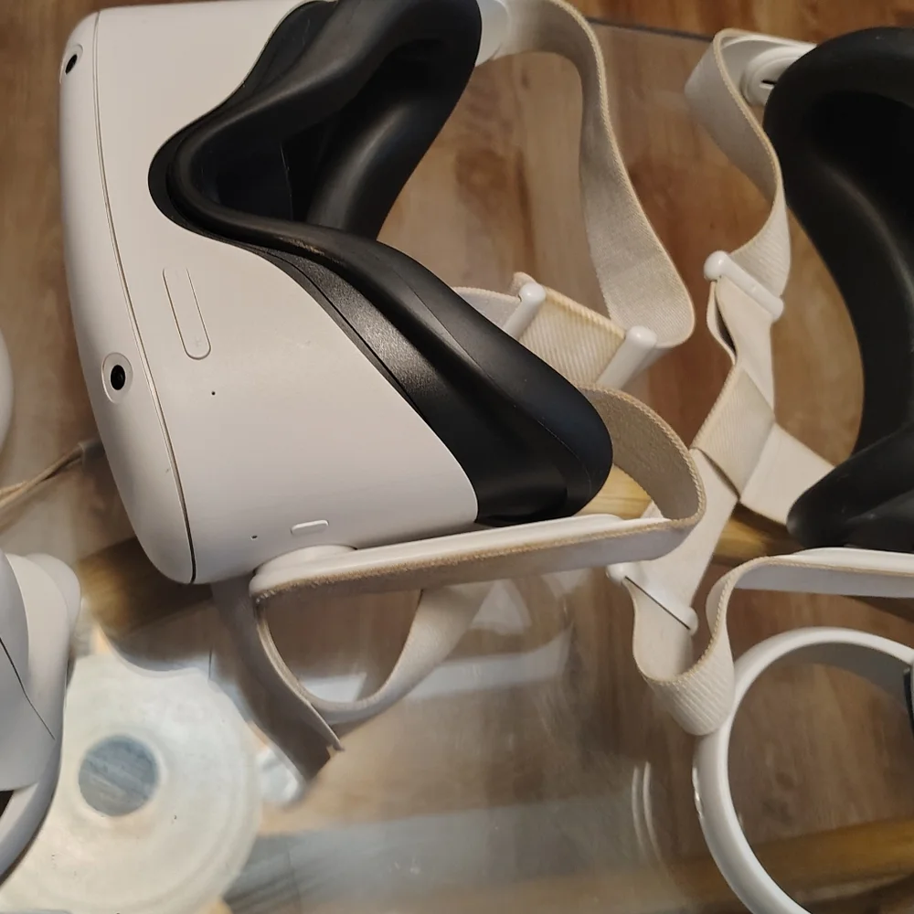 2 VR Headsets and 3 Controllers